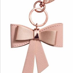 ISO this bag charm from H&M or Kate Spade